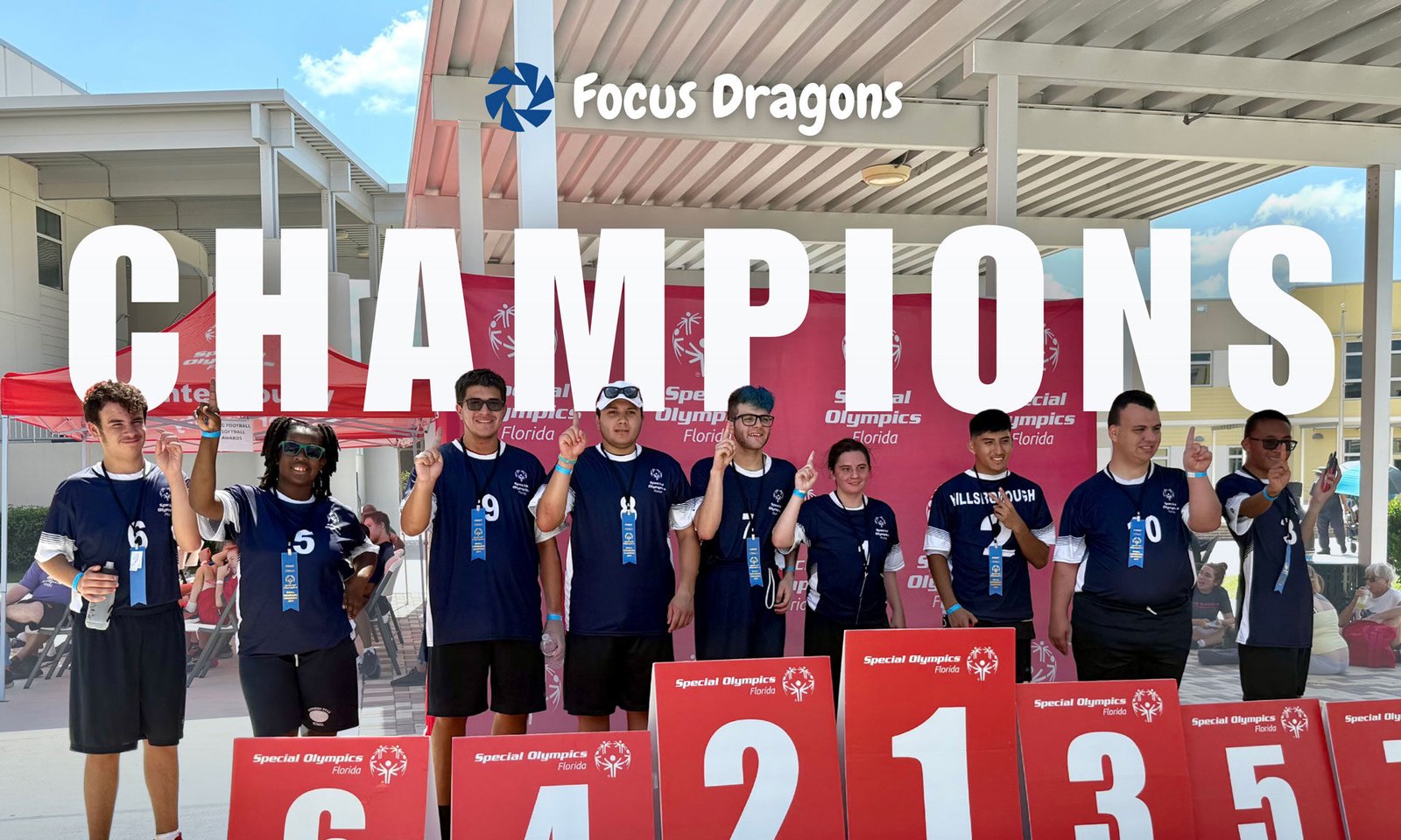 Focus Academy Dragons athletes on the podium at a Special Olympics Florida event